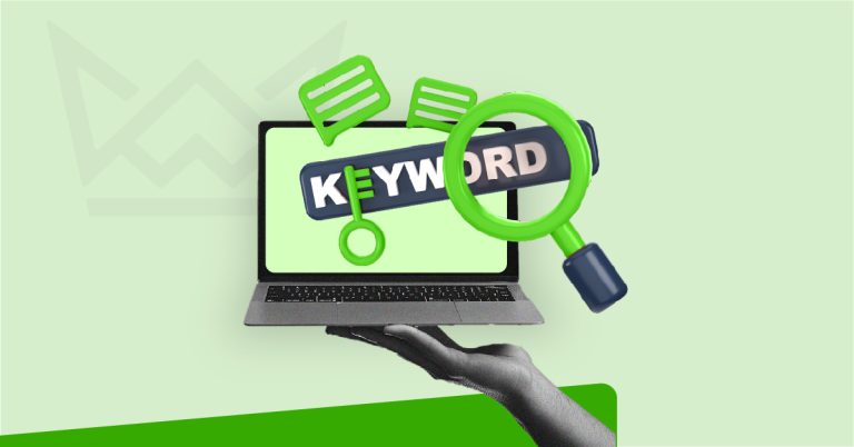 Magnifying glass over the word 'keyword' on a laptop screen, representing keyword research for SEO.