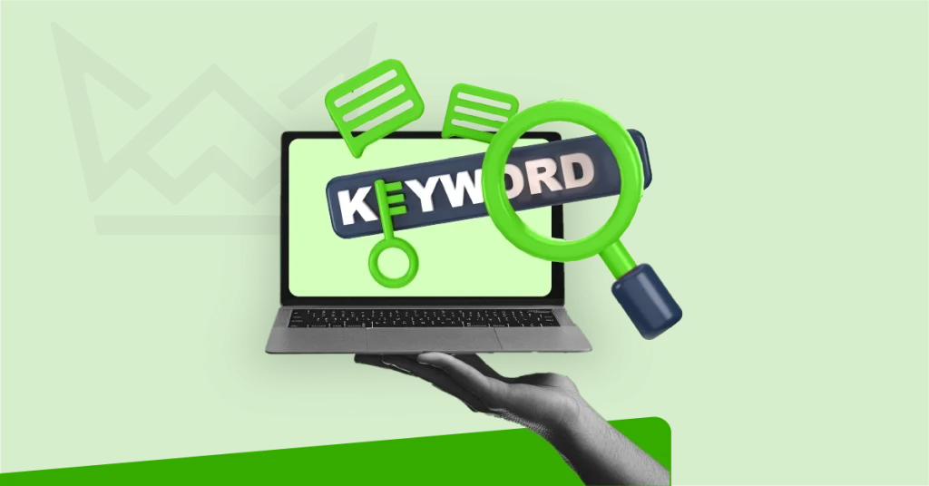 Magnifying glass over the word 'keyword' on a laptop screen, representing keyword research for SEO.